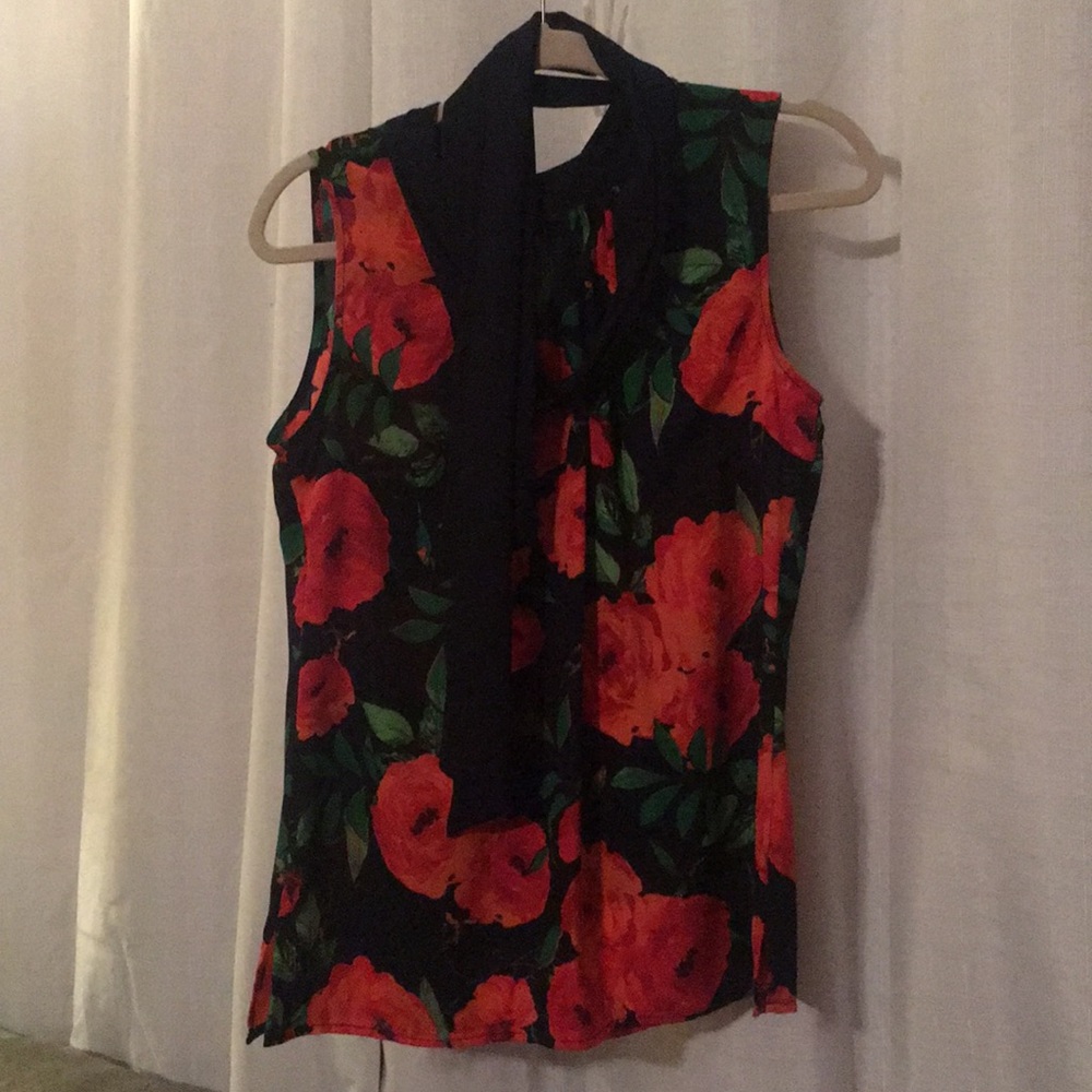 Red floral sleeveless blouse with ribbon collar